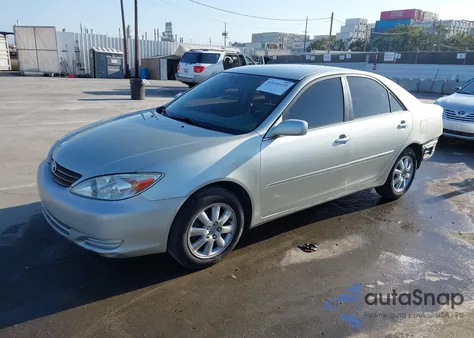 2002 Toyota Camry Xle z USA, uszkodzony, nr VIN JTDBE30K120098696